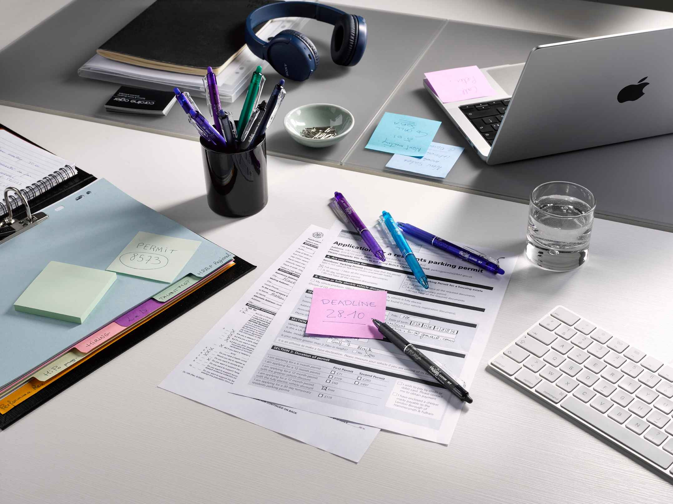 An event planner using an erasable pen for her notes to allow for adjustments